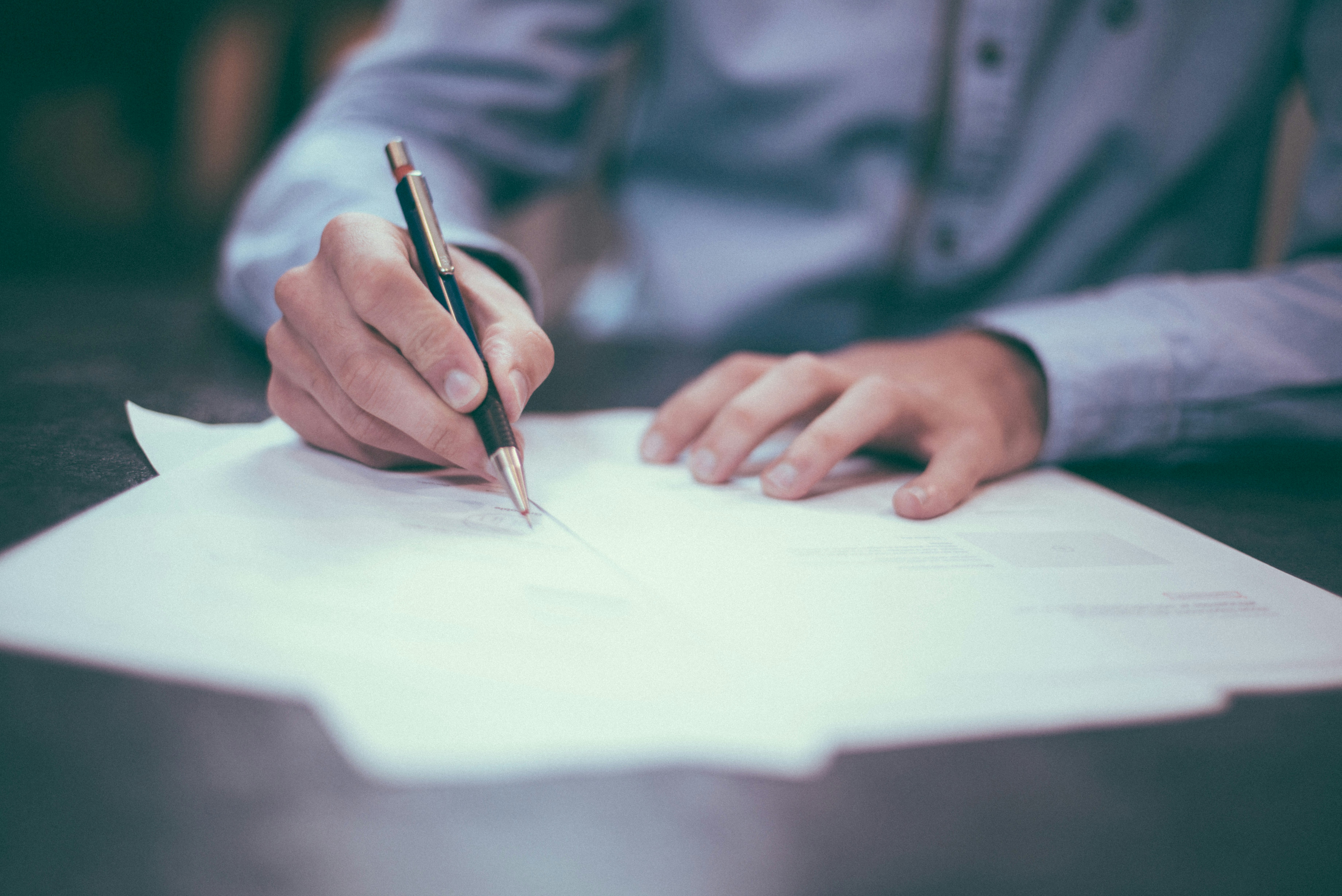 Man writing notes