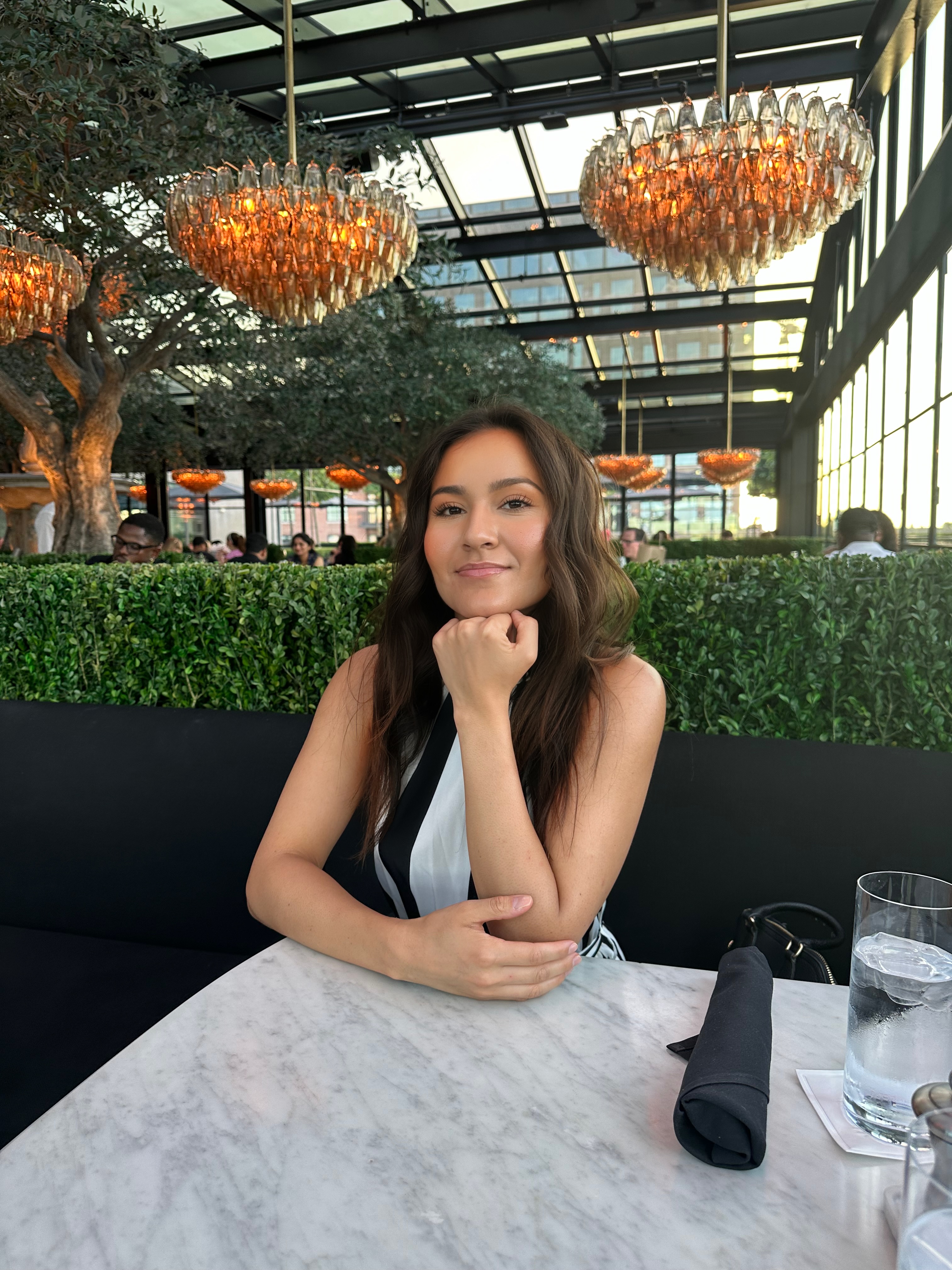 Woman posing in a restaurant.